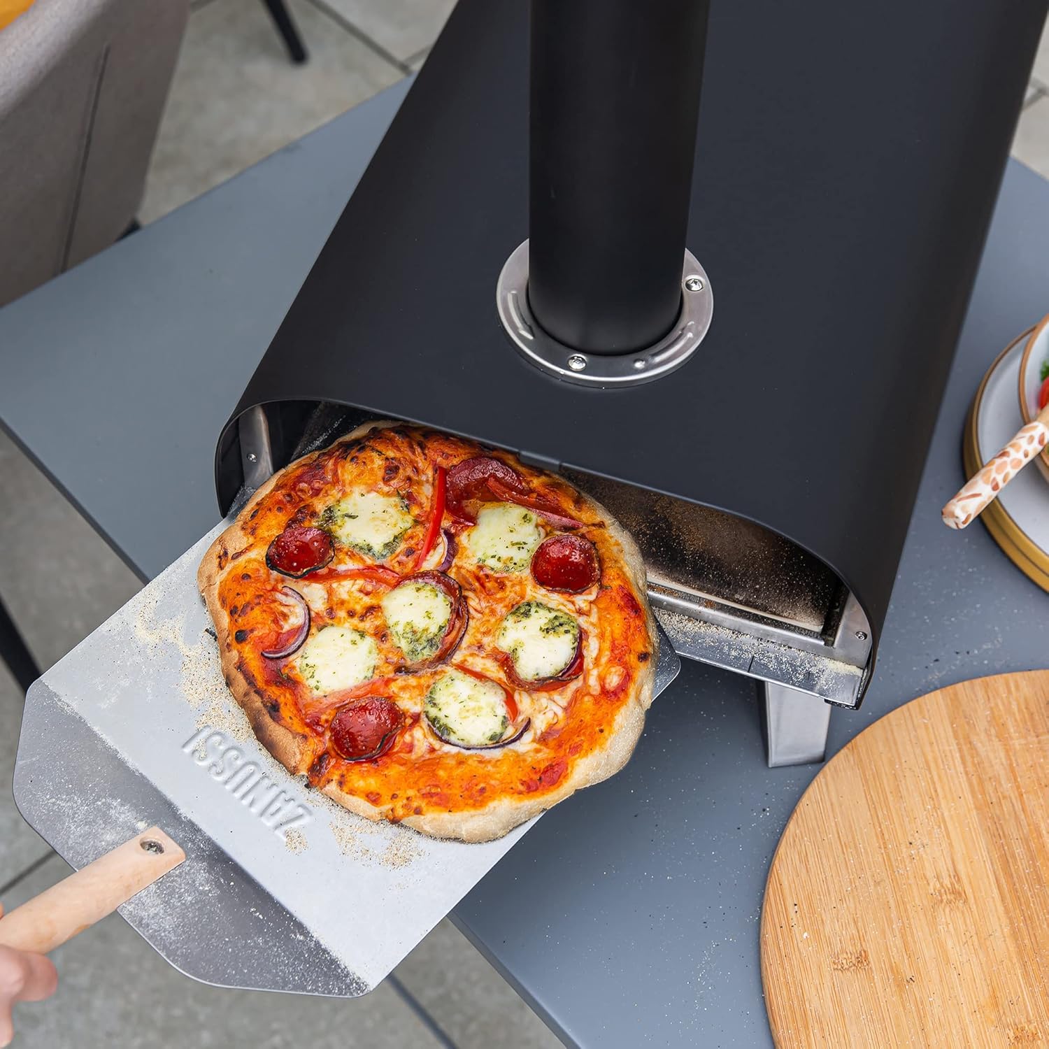 ZPO1BPC Outdoor 12 Inch Wood Pellet Portable Wood Fired Pizza Oven with Paddle and Cover in Black